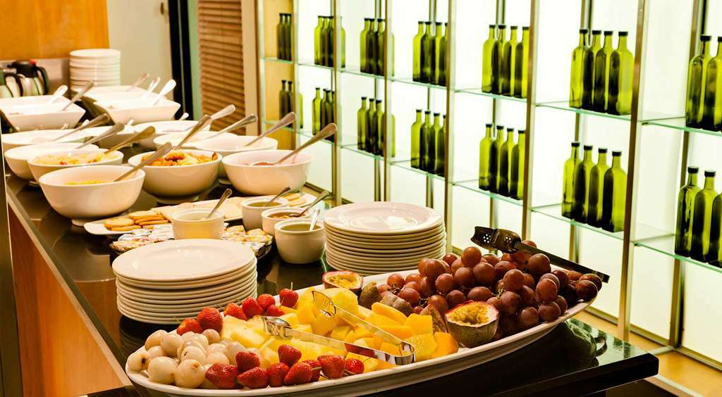 绿洲酒店 乌平通 餐厅 照片